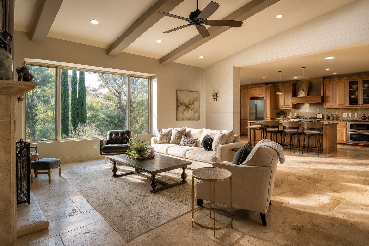 Open-concept great room with vaulted ceilings and travertine floors in Coral Sky neighborhood estate property, Rancho Cucamonga.